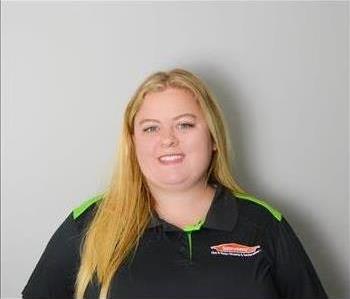 Tiffany Smith Project Manager at SERVPRO of South Atlanta - female employee in front of white wall